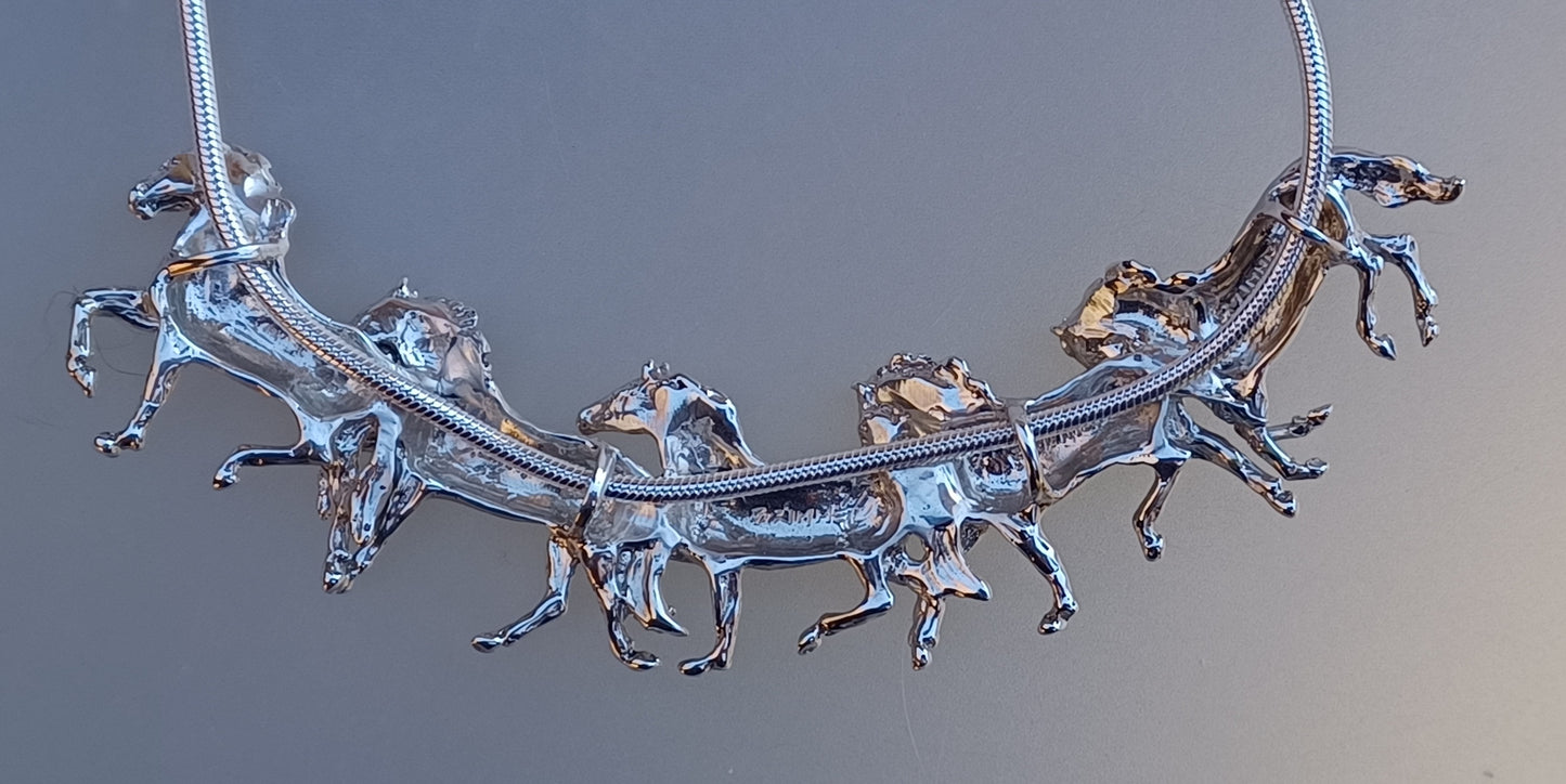 Five Horses Slide Pendant on heavy sterling silver chain.  Signed by Beverly Zimmer