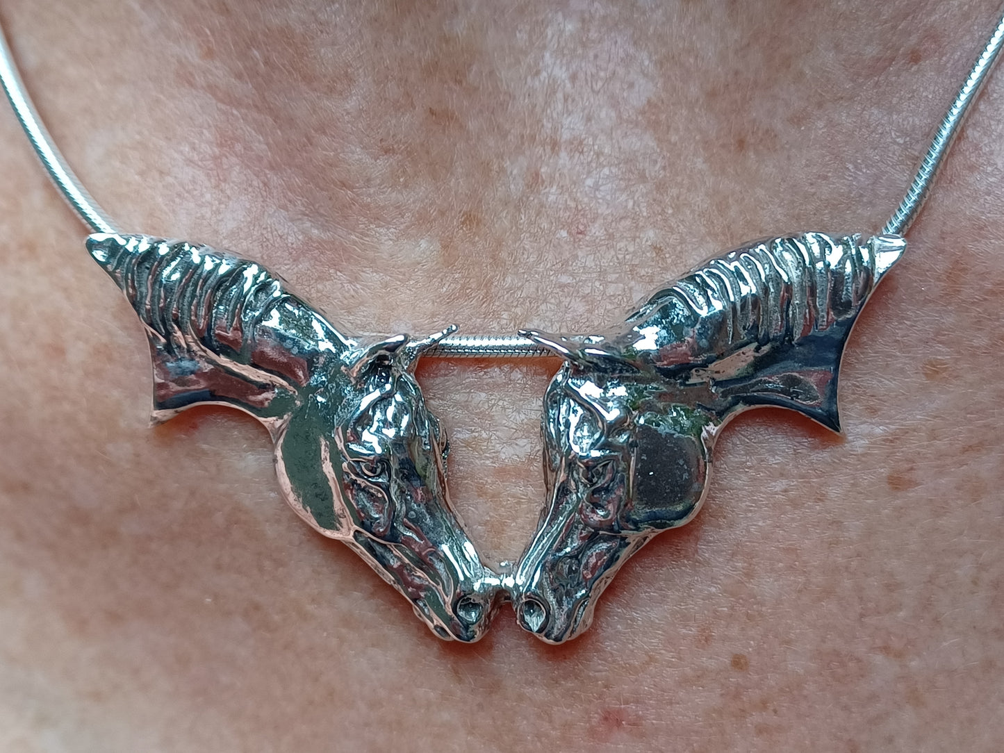 Thoroughbred Nose to Nose pendant and chain Sterling Silver, Sweet necklace from Forge Hill Sculpture.  Zimmer design 2023