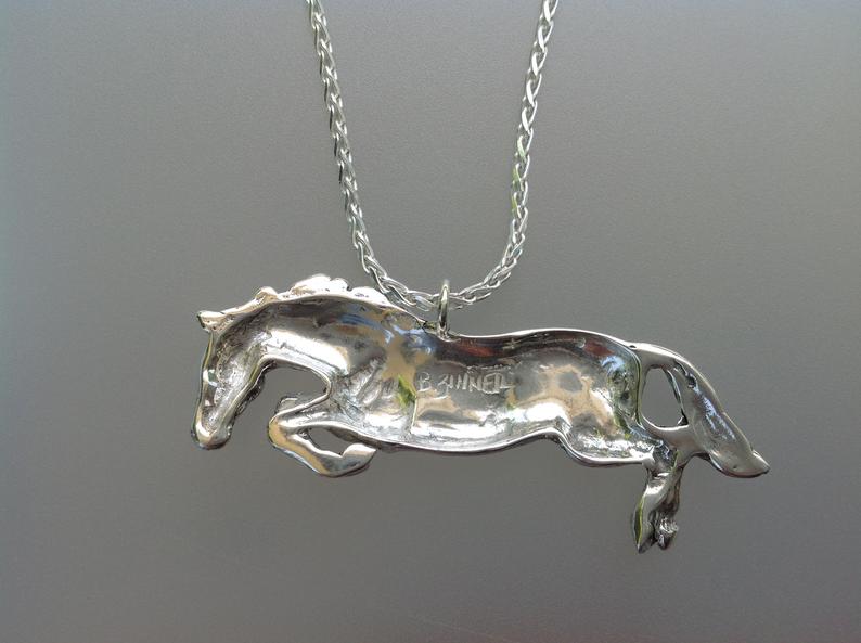 Jumper pendant and chain sterling silver stone set eye. Forge Hill Sculpture