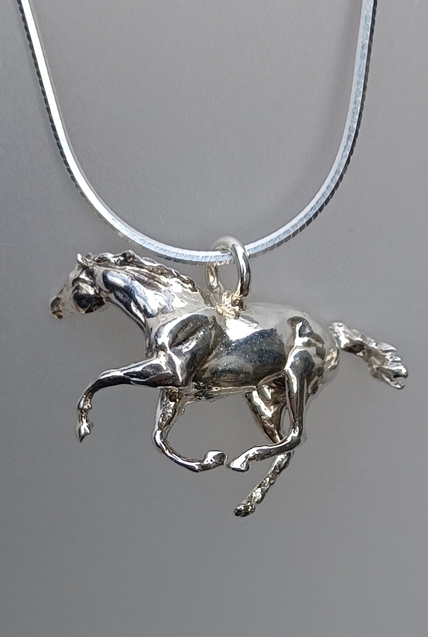 Galloping Horse Pendant Small size 1" Snake Chain included.  Sterling Silver.