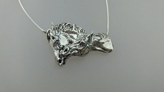 Sterling Silver nuzzling horses pendant and chain with your choice of stone eyes. Zimmer equestrian jewelry