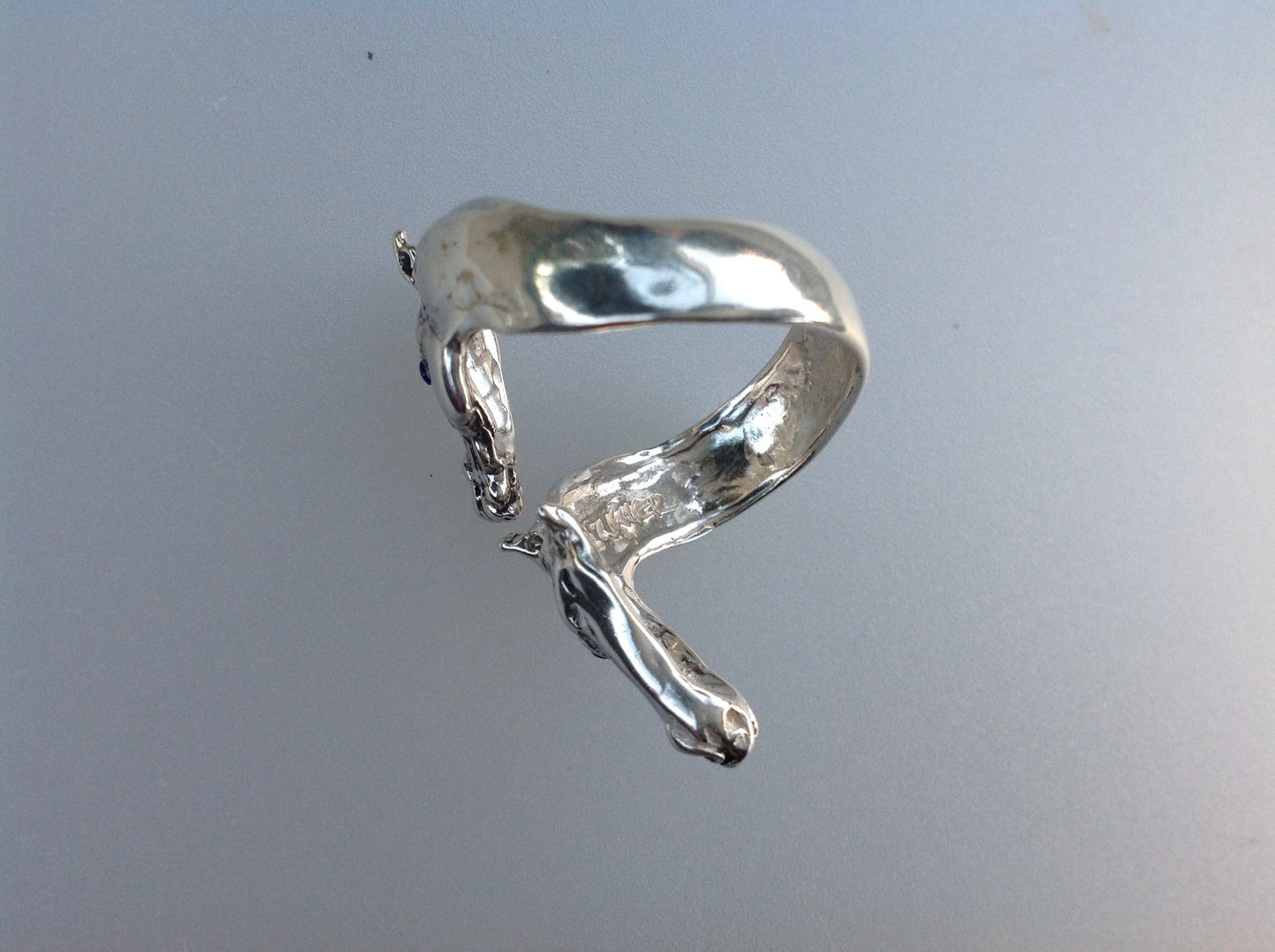 Horses ring adjustable from size 5 to 9.  Sterling silver Handmade in USA  Zimmer design