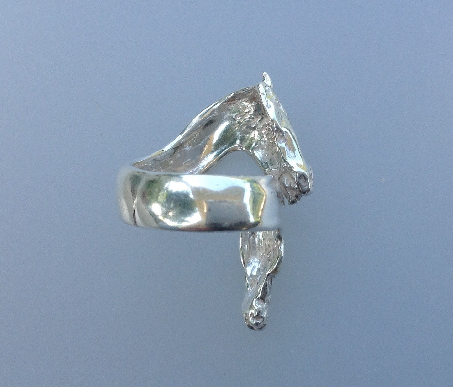 Horses ring adjustable from size 5 to 9.  Sterling silver Handmade in USA  Zimmer design