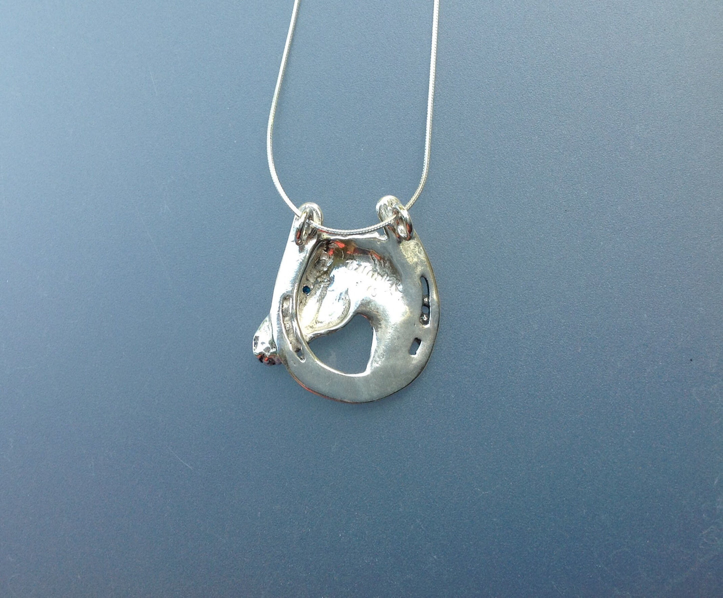Horse in horseshoe  pendant with stone eye & chain  sterling silver  Forge Hill Sculpture jewelry