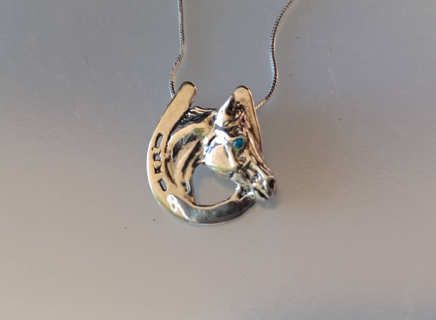 Horse in horseshoe  pendant with stone eye & chain  sterling silver  Forge Hill Sculpture jewelry