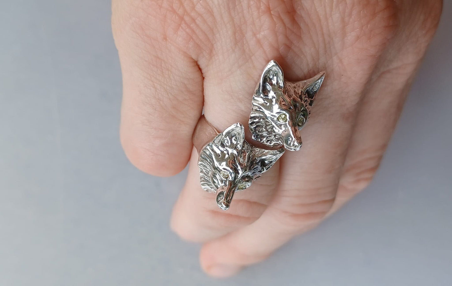 Foxes wrap ring adjustable from sizes 5,6,7,8,9 sterling silver Peridot stone eyes  Zimmer