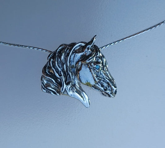 Horse head pendant and chain.   Sterling silver.  Choice of stone for the eye.  Zimmer Equestrian Jewelry Best Prices on Silver Horses