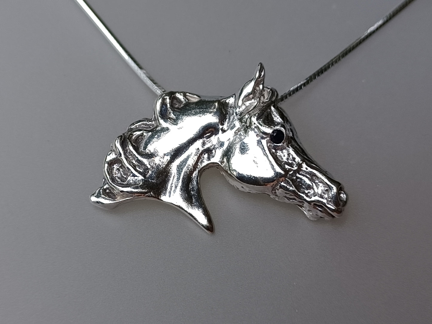 Arabian Horse Head Sterling SilverPendant with Stone set eye.