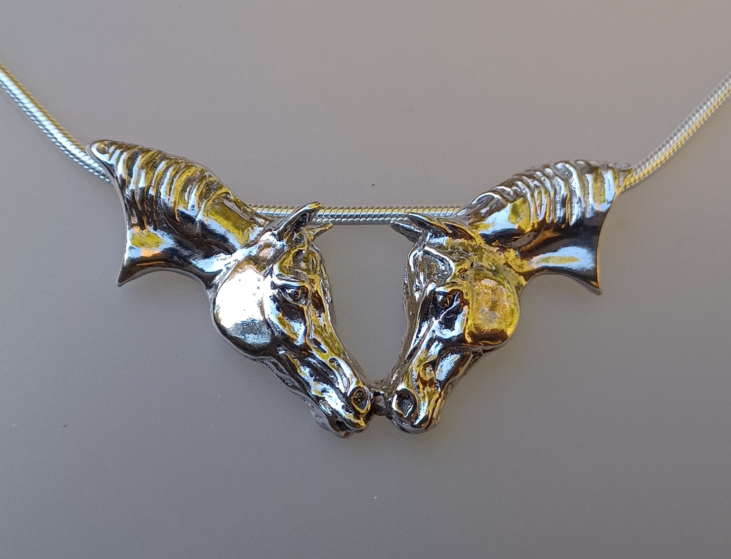Nose to Nose pendant and chain Sterling Silver, Stone set Eyes. Sweet necklace from Forge Hill Sculpture.  Zimmer design 2023 (Copy)