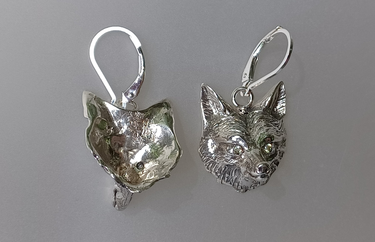 Fox earrings Sterling Silver with stone set eyes. lever Back ear wires. Signed by Artist