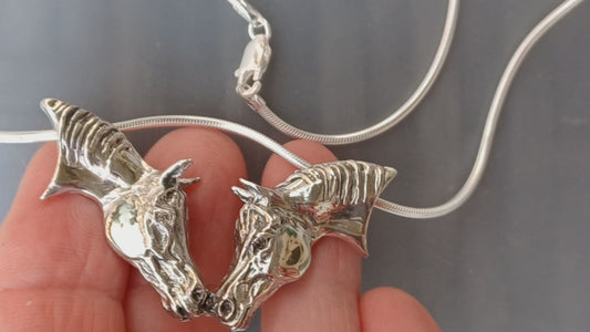 Nose to Nose pendant and chain Sterling Silver, Stone set Eyes. Sweet necklace from Forge Hill Sculpture.  Zimmer design 2023 (Copy)