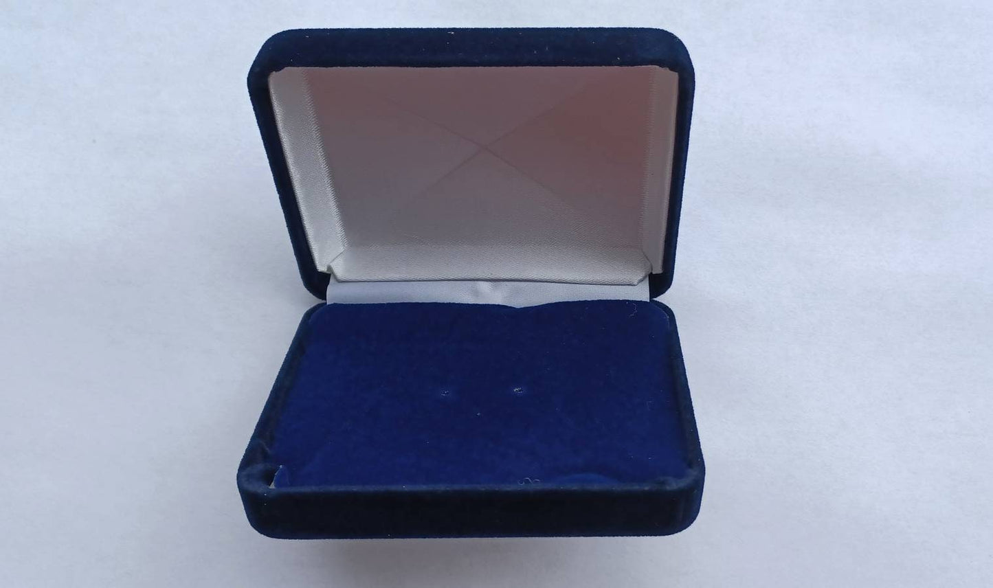 Add a gift box to your order!  Blue velveteen jewelry gift box 2.50 x 3.25.  Available with any purchase.